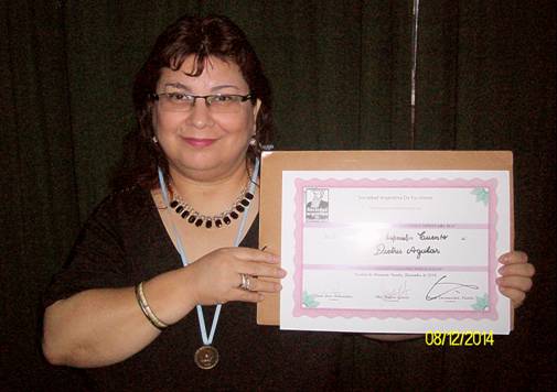 Diploma y medalla por mención especial en concurso literario SADE Fcio. Varela